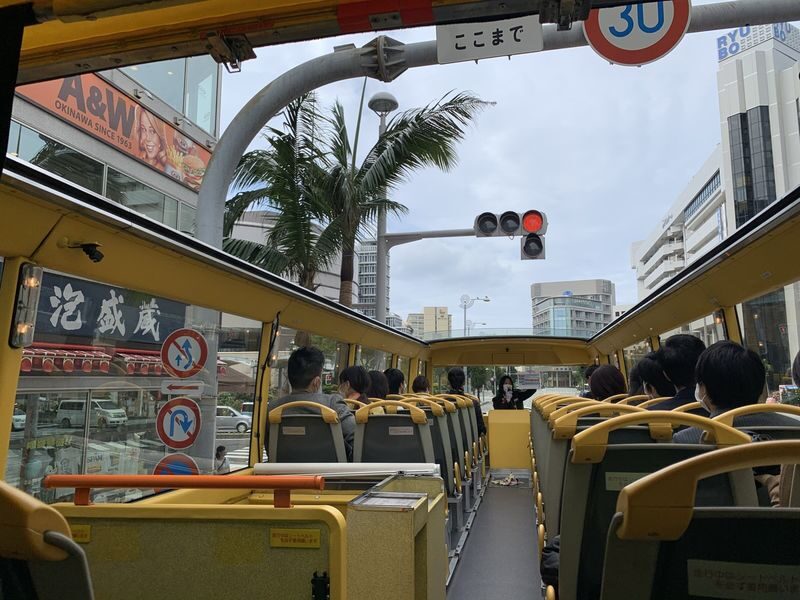 Churashima open top bus tour or Starry sky tour (Naha Departure) - The ride back: tunnel, airport and city views