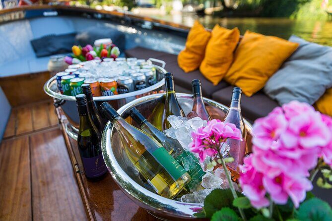 Classic Salonboat Tour in Amsterdam Including Cheese and Wine - Practical Considerations: Weather and Accessibility