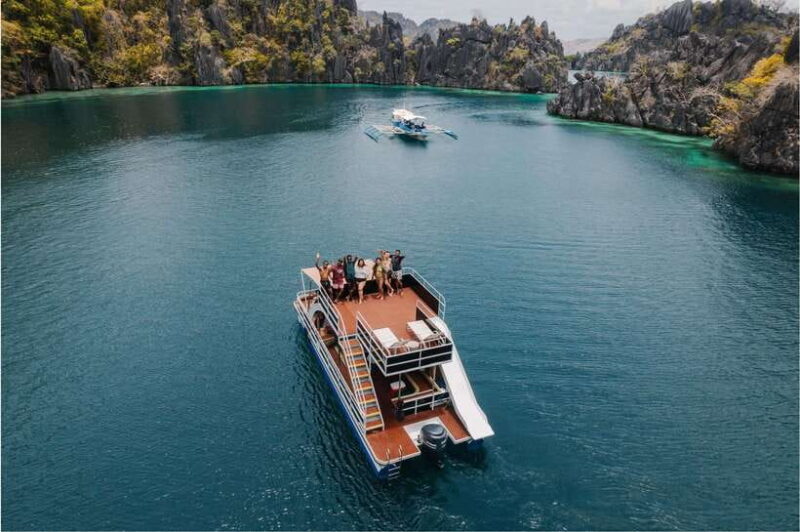 Coron Island Hopping: Private Double Deck Party Boat Slide - Key Points