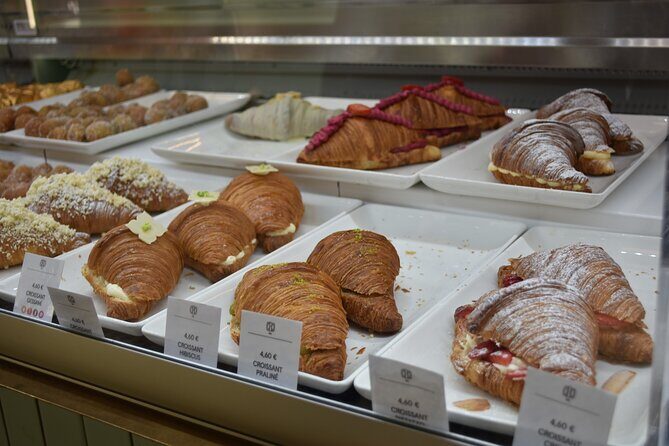 Cultural Walking Tour in Barcelona with Food & Wine Tasting - Visiting La Rambla and Its Surroundings
