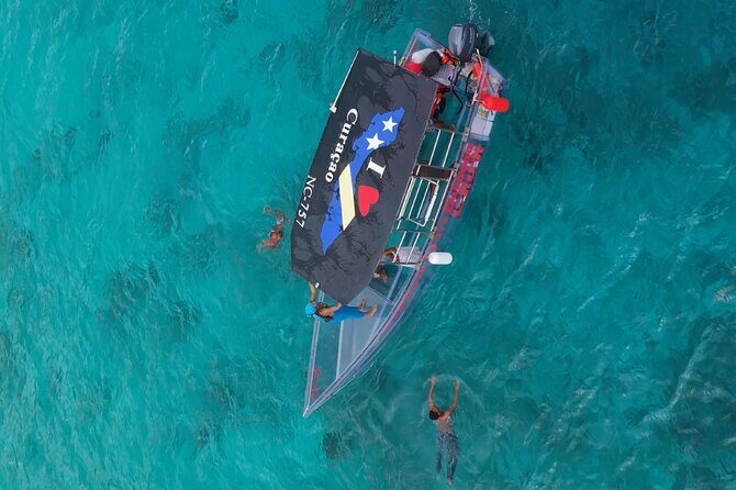 Curacao Flamingos Clear Boat Ride and Porto Marie Beach tour - Key Points