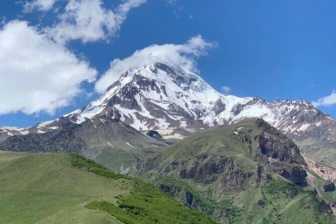 Day tour to mountains Jinvali lake, Ananuri, Kazbegi, Arch friendship - Key Points