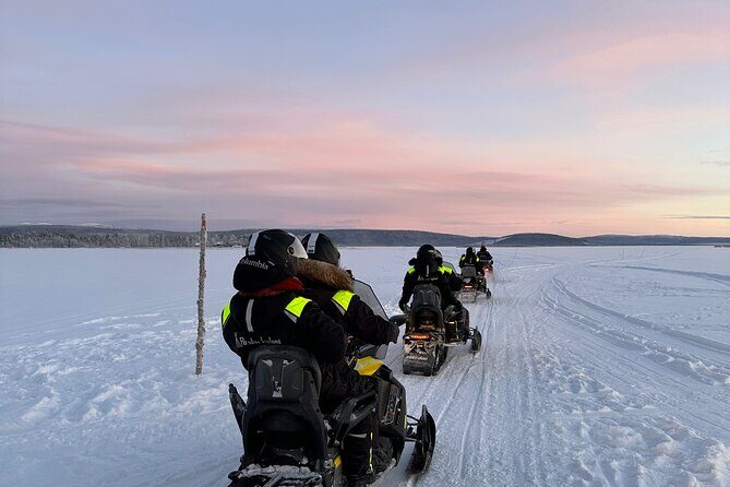 Day tour with snowmobile in Kiruna 10:30 am - Guides and Service