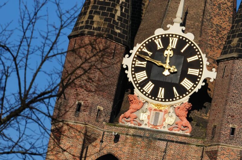 Delft: City Center Walking Tour - Delft City Hall and Vermeer Centrum