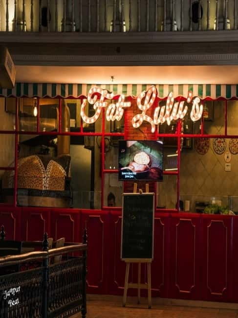 Delhi: Lodhi Street Art Tour with Khan Market & Food Tasting - Market Wanderings and Boutique Finds