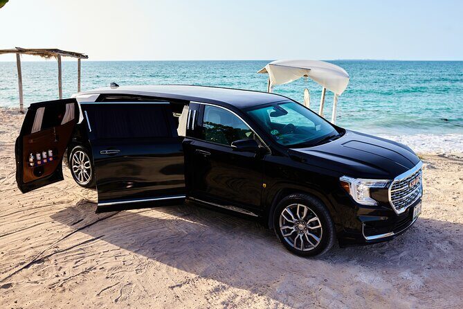 Deluxe GMC Limousine from Cancun Airport to Puerto Morelos - Exploring the Experience in Detail