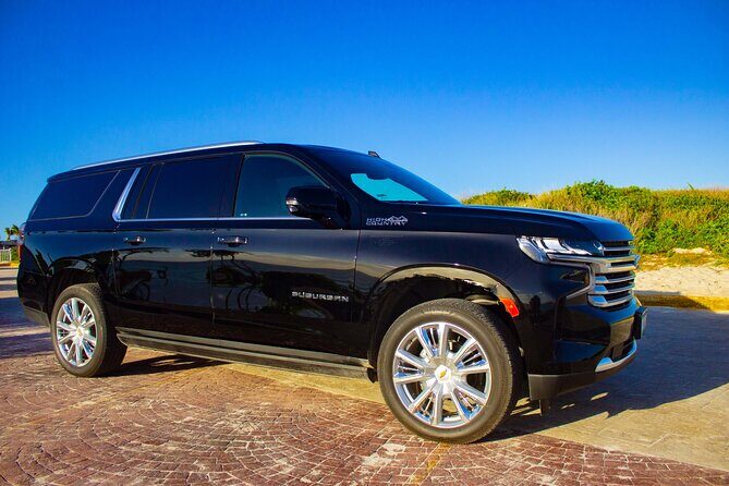 Departure by Luxury Suv from Puerto Morelos to Cancun Airport - Experience a Comfortable Departure from Puerto Morelos to Cancun Airport in Style