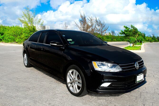 Departures in Luxury Sedan from Tulum to Cancun Airport - Seamless Luxury Transfer from Tulum to Cancun Airport
