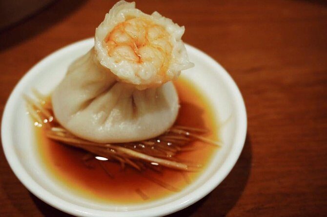 Din Tai Fung Dinner Experience and Acrobatics Show in Shanghai - Key Points