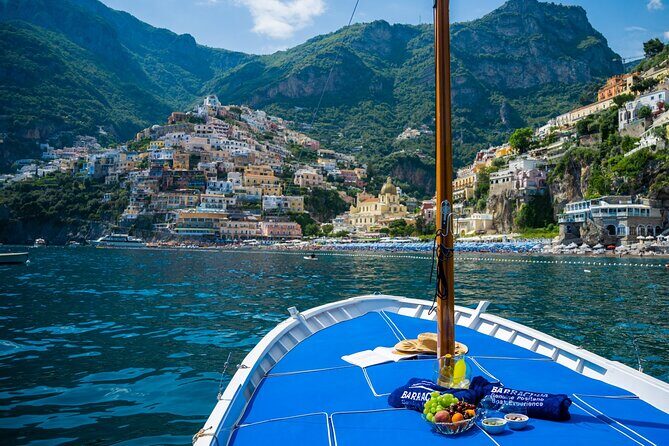 Discover the true essence of the Amalfi Coast by boat - Return to Positano: A Scenic Farewell