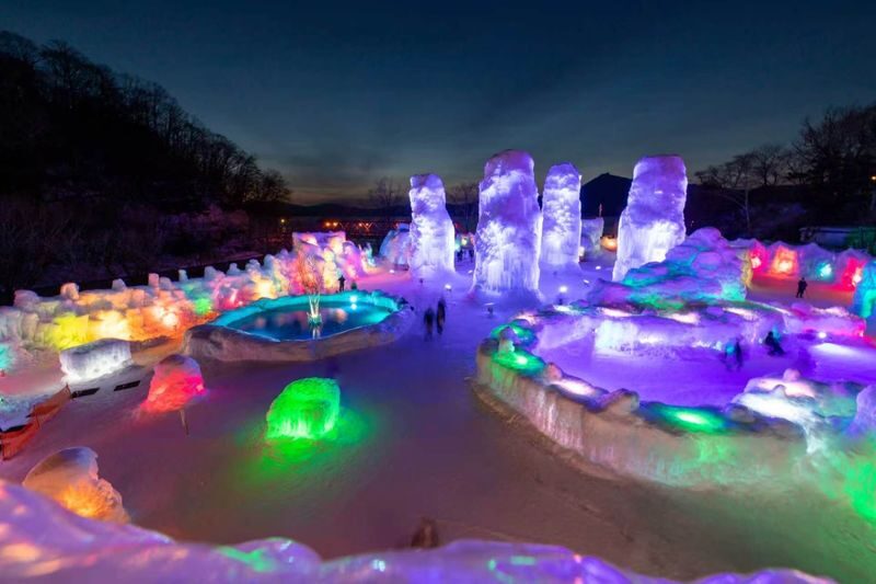 Dreamy ice sculptures decorated with lights-Lake Shikotsu Ice Wave Festival half-day tour at nightfall from Sapporo - The Ice Looks Different After Dark