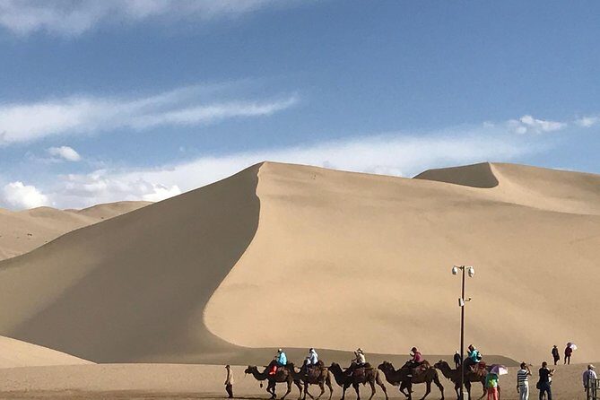 Dunhuang Private Day Tour Mogao Grottoes, Singing Dunes and Crescent Moon Spring - Frequently Asked Questions