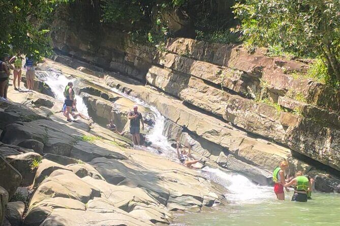 El Yunque Rainforest Waterslides and Luquillo Beach Tour - Exploring the El Yunque Rainforest Waterslides and Luquillo Beach Tour