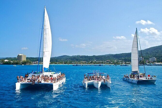 Exotic Catamaran Party Cruise and Snorkeling to Dunns River Falls - Dive into the Caribbean Spirit with the Exotic Catamaran Party Cruise and Snorkeling to Dunns River Falls