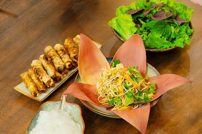 Experience Hanoi Cooking Class with Free Wine Tasting - Key Points