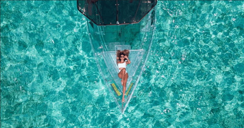Explore the sea of cozumel in a transprent boat with drinks and snorkel. - Dive Into the Details: What to Expect