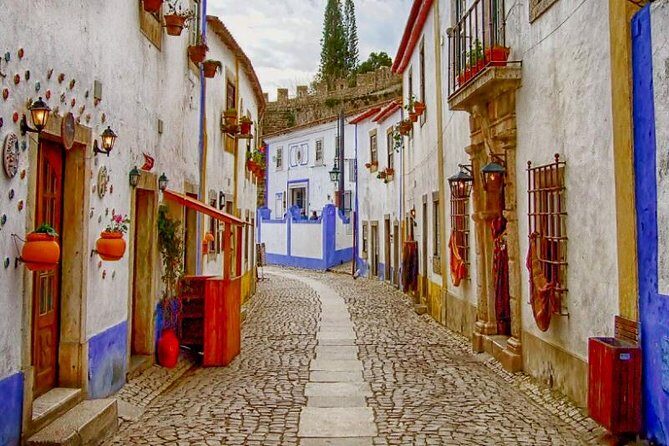 Faith and Heritage: Fátima Batalha Nazaré and Óbidos Private Tour from Lisbon - Key Points