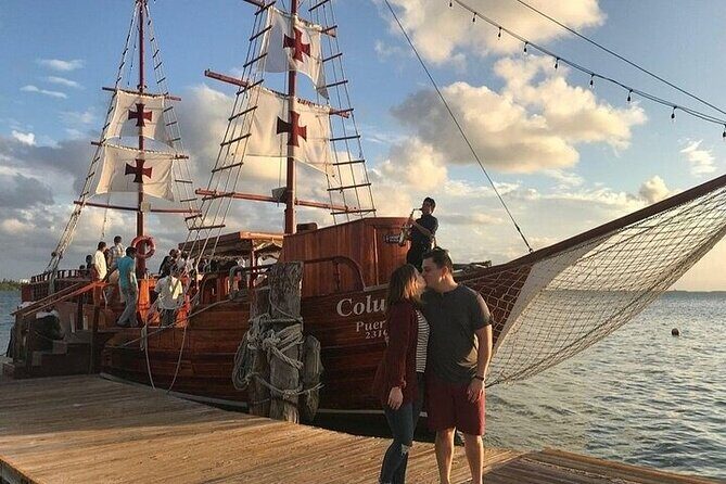 Feel the love on a romantic dinner at Cancun sea, with live music and open bar. - The Sum Up