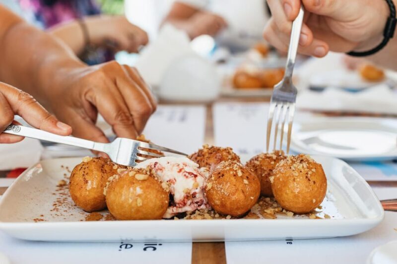 Fira: Guided Foodie Walking Tour with Tastings - Starting Point and Overall Structure