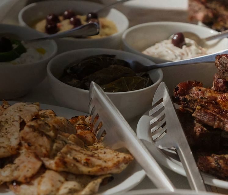 Fira: Private Day Cruise with BBQ, Drinks, & Hot Springs - Key Points