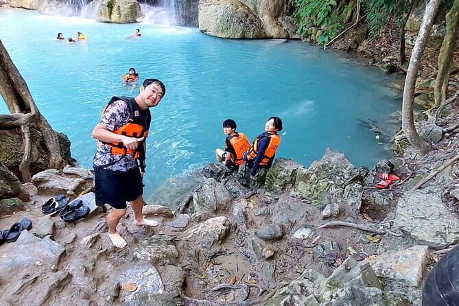 Floating and Railway Markets and Erawan Waterfall (Group Tour) - A Day Exploring Thailand’s Hidden Gems: Floating Markets, Erawan Waterfall, and the River Kwai