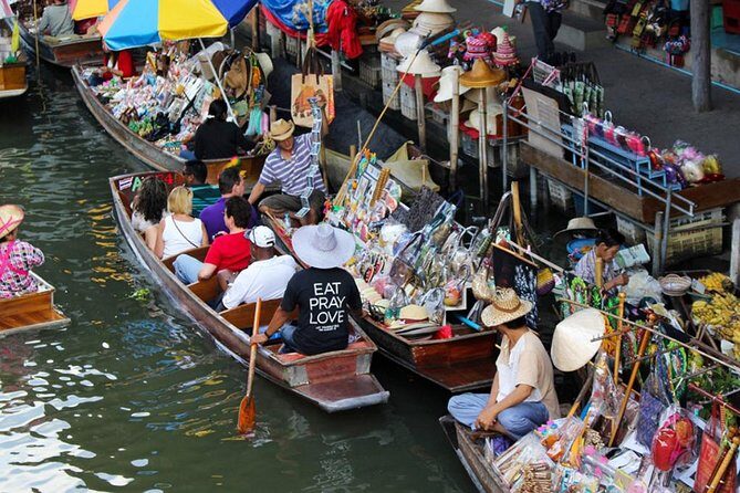 Floating Market Damnoen Saduak and Meklong Railway Market: Half Day Tour - A Deep Dive Into This Bangkok Market Adventure