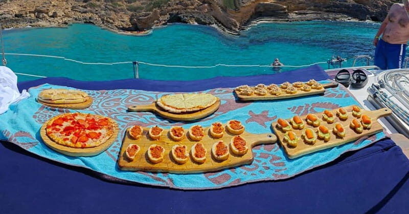 From can Pastilla : Sailing boat trip with Food & Drinks - The Experience Provider and Flexibility