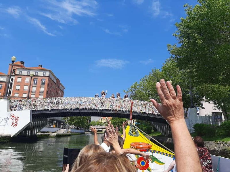 From Coimbra: Tour to Aveiro, Costa Nova beach, and Moliceiro boat ride - From Coimbra: Tour to Aveiro, Costa Nova beach, and Moliceiro boat ride