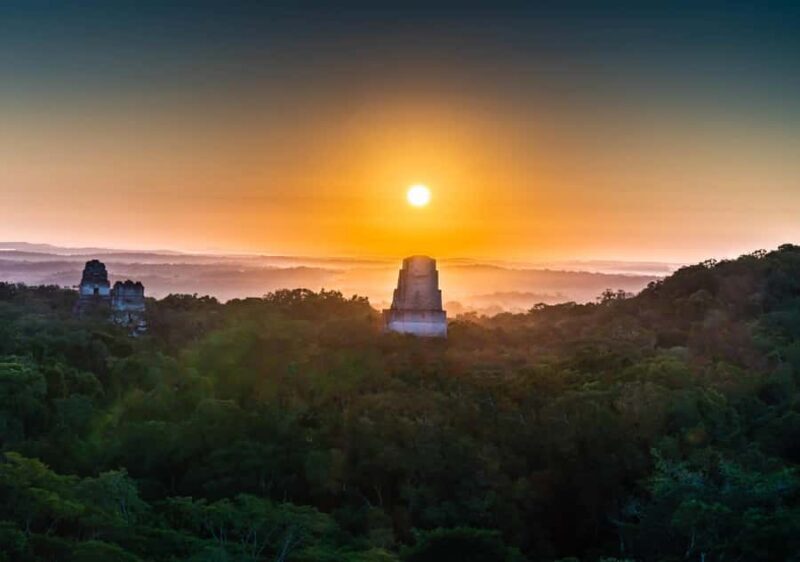 From Flores: Tikal Ruins Sunrise Guided Tour - Exploring the Tikal Sunrise Experience in Detail