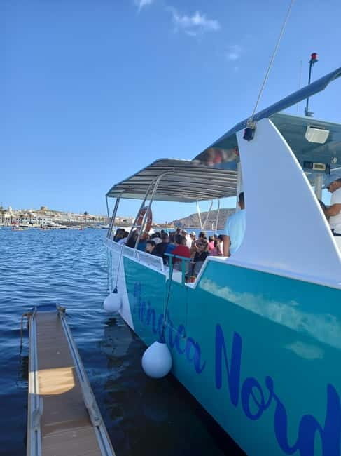 From Fornells: North Coast Beaches Cruise with Swim Stops - The Guides and Commentary
