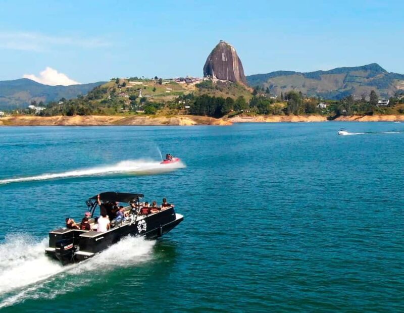 From Guatape: Pablo Escobar Mansion, Paintball & Boat Ride - The Guatapé Town Tour