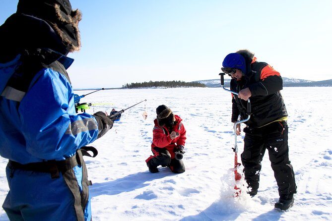 From Ivalo: Ice Fishing Safari to Lake Inari, reindeers & lunch - Ice Fishing: Patience and Anticipation