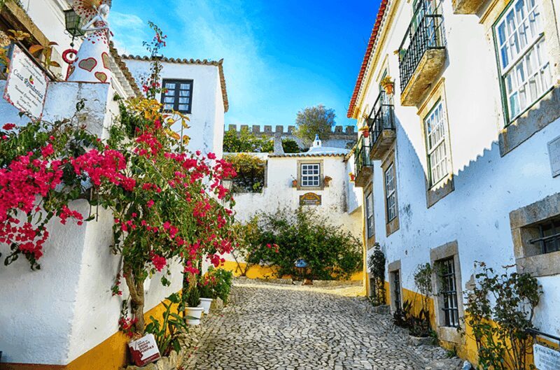 From Lisbon: Fátima, Nazaré, Óbidos Private Tour premium car - Exploring Portugal’s Sacred and Coastal Heritage