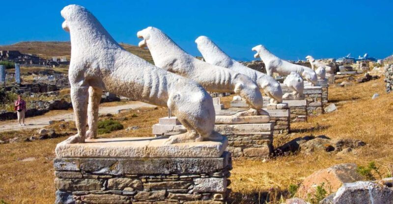 From Mykonos: Delos Archaeological Site Guided Evening Tour - Key Points