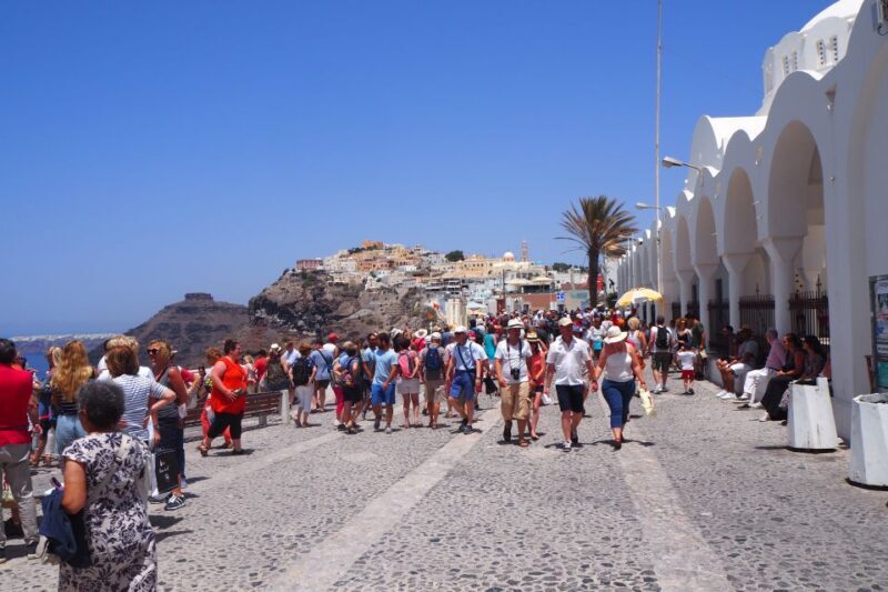 From Paros: Santorini Full-Day Boat Trip - Arrival at Santorini and the Guided Bus Tour