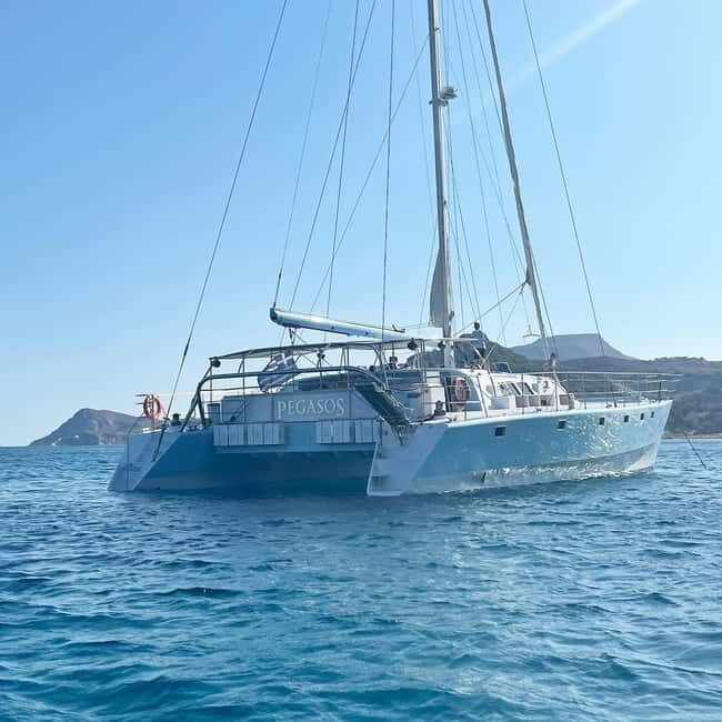 From Rhodes: Half-Day Catamaran Cruise with Swim Stops - Key Points