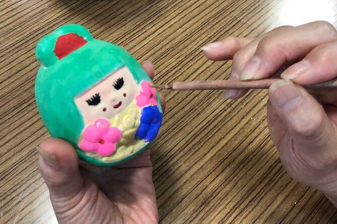 Fukuoka Open Top Bus and Hakata Doll Painting Experience with Guide - A Detailed Look at the Experience