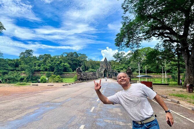 Full Day Tour Phnom Penh to Siem Reap Taxi, Angkor Visit & Return - Jungle Mystique at Ta Prohm