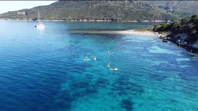 Golfo Aranci tour SUP Paddleboard Dolphin watching, aperitif - An Immersive Day on Sardinia’s Coast with SUP and Dolphins