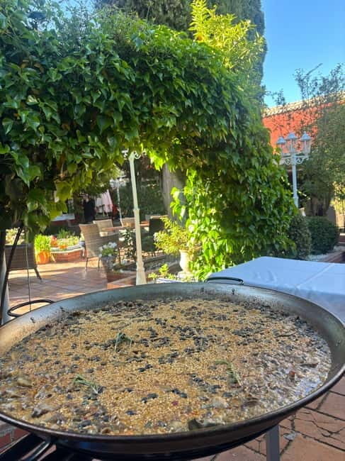 Granada: Dinner with Paella on a Terrace in the Albayzín and Live Flamenco - Key Points