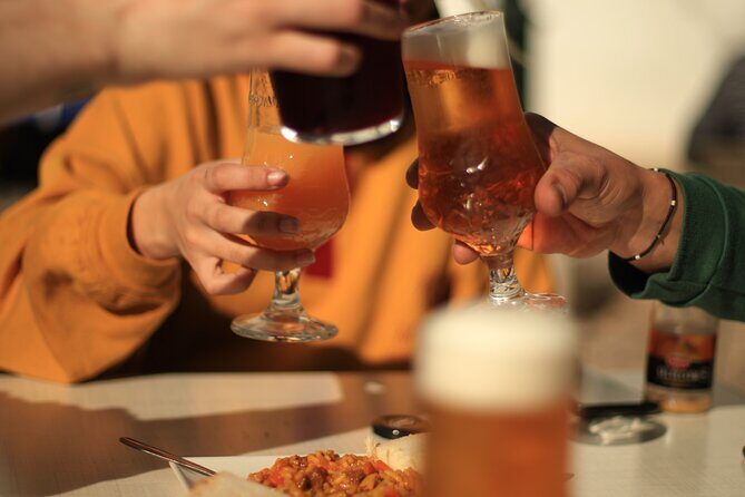 Granada Highlights Tour with Tapas Breaks by Electric Bike - Key Points
