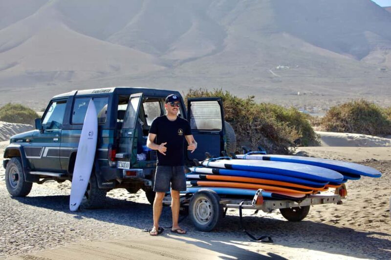 Group Surf Lessons in Lanzarote, learn with a local team - The Sum Up: A Surfing Adventure with Heart and Scenery