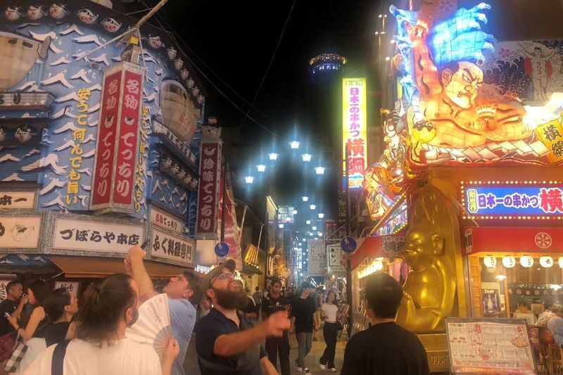 Guided Food Tour with 15 Dishes in Shinsekai, Osaka - Tsutenkaku and the stories between meals
