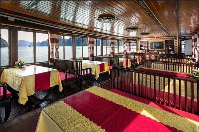 Halong bay 4 hours boat tour from Halong city with 2 caves, kayak - Key Points