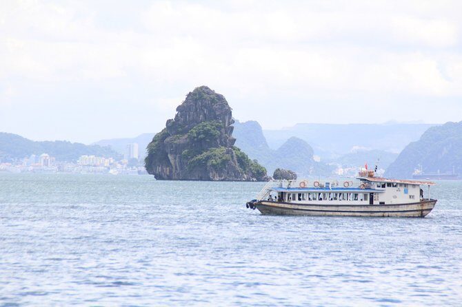 Halong bay Full Day Cruise trip: kayaking, surprise cave, titop island, lunch - Sunset and Reflection on the Return
