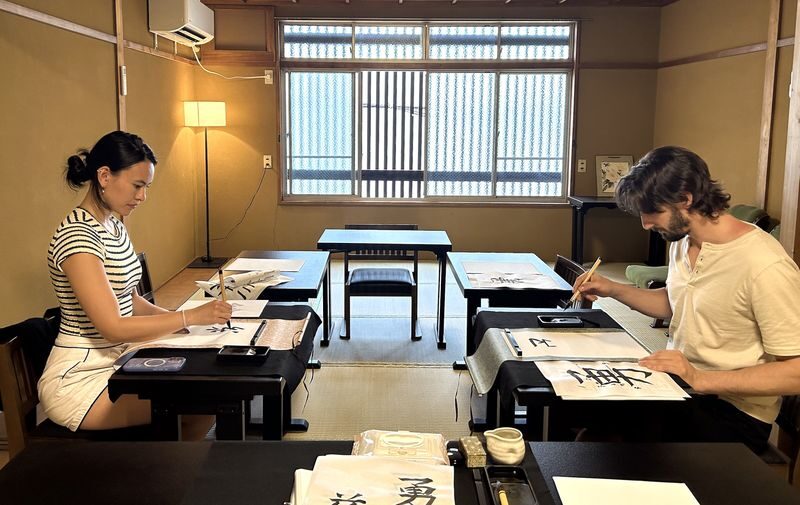 Hands-on Zen Calligraphy & 150-Year-Old Kyoto Machiya Tour - Tea, seasonal sweets and a little breathing room