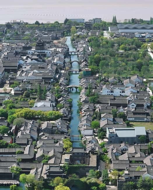 Hangzhou to Haining: Tide Park, Folk Museum & Shadow Puppet - Tide Viewing Park: The Power of the Qiantang Tidal Bore
