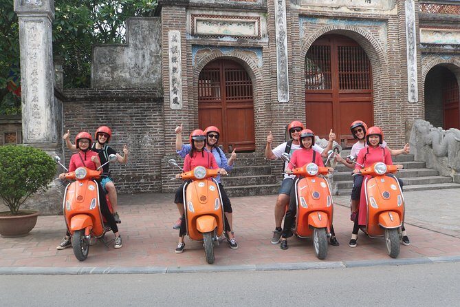 Hanoi Vespa Full Day City & Countryside with Female Ao Dai Riders - Itinerary Breakdown: From Urban Buzz to Tranquil Fields