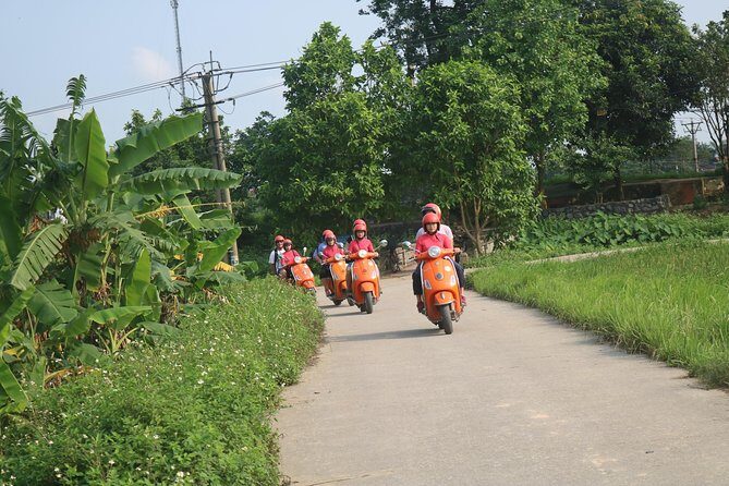 Hanoi Vespa Full Day City & Countryside with Female Ao Dai Riders - The Sum Up