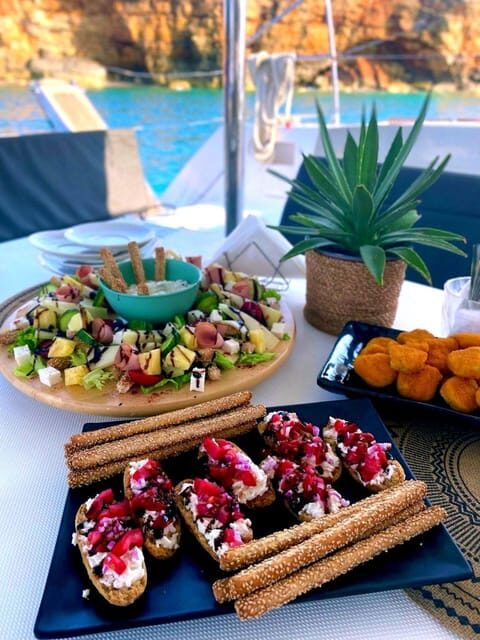 Hersonissos: Sunset Catamaran Cruise with Snacks and Drinks - Food and Drinks